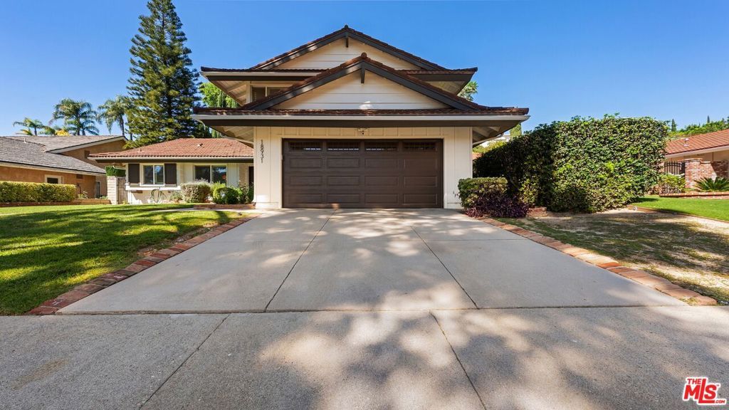 Photo of 18931 Kinbrace Street, Porter Ranch, CA 91326 (MLS # 26668123)