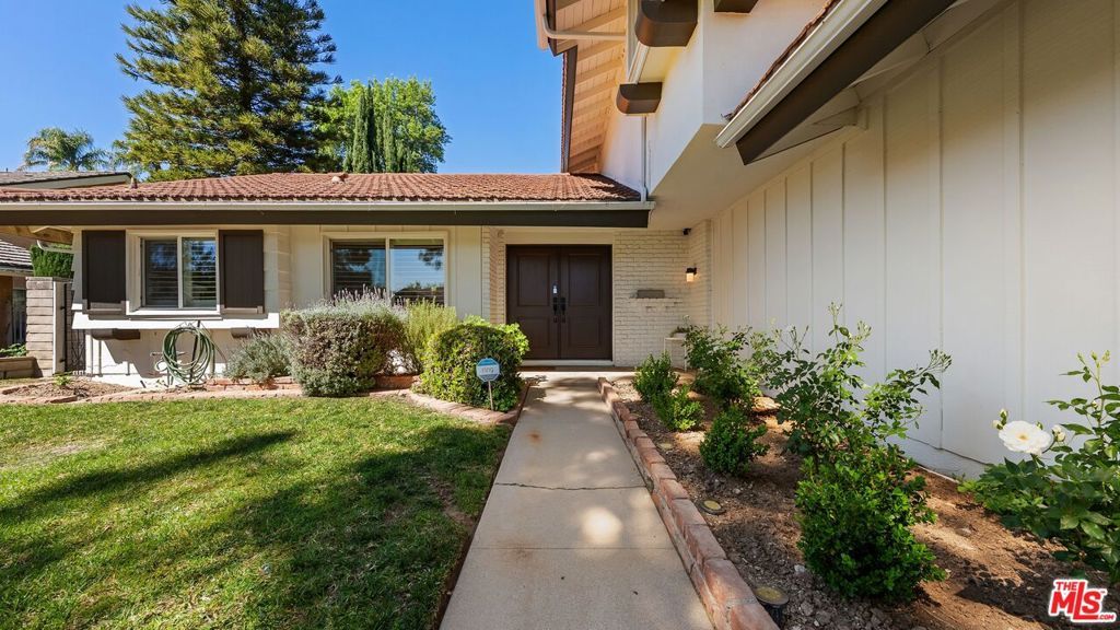 Photo of 18931 Kinbrace Street, Porter Ranch, CA 91326 (MLS # 26668123)