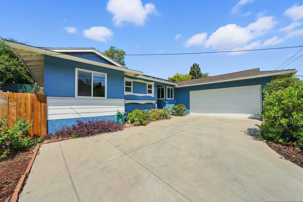 Nestled in one of La Mesa's most inviting neighborhoods, this delightful home offers timeless character and charm paired with endless potential. Step inside to discover original details that showcase the homes mid-century charm, from the rich wood flooring throughout to the thoughtfully designed layout that makes every space feel inviting. The kitchen carries vintage character with plenty of room to reimagine the area into your dream space, while the bedrooms offer a comfortable and cozy space to retreat. Outside the backyard brings a generous covered patio and mature landscaping together that invites gardening, entertaining or simply enjoying a sunny La Mesa afternoon. Conveniently located near schools, shopping, dining, and freeway access, this home is move-in ready and waiting for you!
