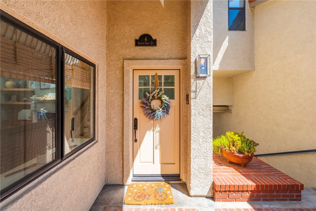 **Home is NOT being leased furnished.*** Step into luxury living at 4 Santa Cruz Court in the prestigious guard-gated community of Manhattan Village. This beautifully updated home offers the perfect blend of elegance and comfort, designed to exceed expectations.
Located just a short stroll from the newly renovated Manhattan Village shopping and dining plaza, this home boasts a prime location within the complex. Enjoy the convenience of open spaces, walkways, community pool and jacuzzi areas, all while being minutes away from LAX, downtown Manhattan Beach, and the sandy shores.
Step inside to discover a meticulously reimagined space where no expense has been spared. Designer materials and furnishings create an inviting atmosphere filled with natural light. Traditional flooring paired with cozy jute rugs embody the essence of beach-style living.
This exquisite home features 2 bedrooms, 2.5 upgraded bathrooms, and a remodeled kitchen with top-of-the-line, Viking & Jenn-Air appliances. The living room, complete with a fireplace, seamlessly flows into a wonderful patio, extending the living space outdoors. Additional highlights include a family room, dining room, open kitchen, decks, attached garage, convenient laundry area, and central air.
Experience the ultimate Manhattan Beach lifestyle with award-winning schools, Marine Avenue Park, and the executive par 3 course at the Westdrift just moments away. With pool and spa amenities, security guards, and gated privacy, this is coastal living at its finest.