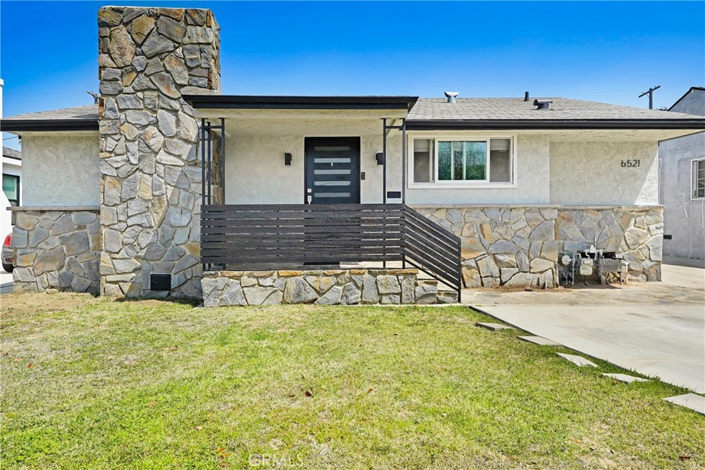 Discover the perfect blend of warmth, character, and modern comfort in this beautiful 3-bedroom, 2.5-bath home, nestled in the highly desirable Kentwood neighborhood of Westchester. Step into the spacious living room, where a stone-accented fireplace creates a cozy focal point. The bright kitchen is thoughtfully designed with white shaker cabinets, quartz countertops, custom tiled backsplash, a Bertazzoni gas range, GE stainless steel refrigerator, and a charming eat-in dining area. Wood-look tile flooring extends throughout the home, providing a cohesive, stylish look with the added benefit of low-maintenance durability. The expansive primary suite features two generous closets and plenty of room to unwind. The additional bedrooms are equally inviting, with one offering an oversized layout. Tucked away at the rear of the home is a versatile den or library perfect as a quiet reading nook, home office, or creative space with endless potential. A convenient half bath is ideally located for easy access from both the den and the finished basement— perfect for guests or everyday use. Downstairs, you’ll find a carpeted, finished basement of approximately 400 sq ft. This flexible space could easily transform into a media lounge, home gym, office, art studio or entertainment zone—the possibilities are endless. A HVAC system was installed in 2015 to help cool you down during the summer months. At the rear of the property, you'll find a beautifully finished 850 sq ft ADU complete with two skylights, recessed lighting a full kitchen featuring dark shaker cabinets, stainless steel appliances, and a spacious tiled bathroom. The ADU has two mini-split systems and is perfect for hosting guests, generating rental income, or setting up a private work-from-home suite. Enjoy Southern California living at its best in the private back patio/yard retreat—ideal for entertaining or relaxing outdoors. A detached two-car custom garage door, carport, and extended driveway offer ample parking. Washer & dryer hookups are located in the garage, while a separate storage shed behind the ADU adds even more functionality. The property is equipped with tankless water heaters serving both the main house and the ADU, providing energy-efficient, on-demand hot water throughout. Conveniently located near shops, restaurants, grocery stores, LAX, and everything the Westside has to offer—this home perfectly blends comfort, style, and versatility in one of LA’s most desirable neighborhoods.