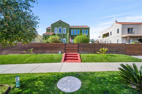 Photo of 1245 S Hudson Avenue, Los Angeles, CA 90019 (MLS # SR26154953)