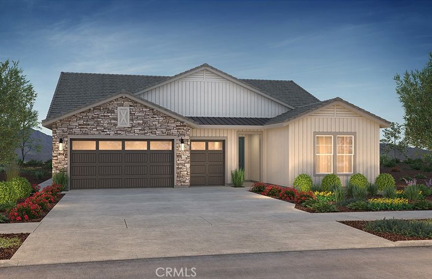 Immerse yourself in the relaxed elegance of Paso Robles wine country with this beautifully designed Liberty II home while visiting Nevina, a 55+  community. The gourmet kitchen is a true centerpiece, featuring upgraded quartz countertops, an elegant tile backsplash, premium KitchenAid stainless steel appliances, and sophisticated smoked gray stained cabinetry. A dramatic rolling wall at the dining room extends the living space to a covered patio with gas BBQ stub, while an interior fireplace with mantel adds warmth and ambiance, creating the perfect setting for both entertaining and quiet evenings. The private primary suite offers a serene retreat, highlighted by tall windows and a spa-inspired bath with quartz counters, a tiled shower with frameless glass, and Shea Shower. Designer details elevate the home throughout, including luxury vinyl plank flooring in main living areas, plush carpet in bedrooms, upgraded tile baths, two-tone interior paint, and 5½" baseboards. With laundry cabinetry and sink, brushed nickel accents, and energy-efficient LED lighting, this move-in ready residence combines style, comfort, and modern function. Nevina™—a Trilogy® Boutique Community™ offers more than a home—it’s a lifestyle thoughtfully designed for those seeking connection, wellness, and enjoyment. With an additional membership, residents can experience exclusive resort-style amenities, a planned vibrant clubhouse, and spaces that bring neighbors together. All of this is complemented by Paso Robles’ signature charm—rolling vineyards, culinary treasures, and breathtaking scenery—making wine country living truly unforgettable. Renderings may not reflect exterior and/or color scheme of home for sale.