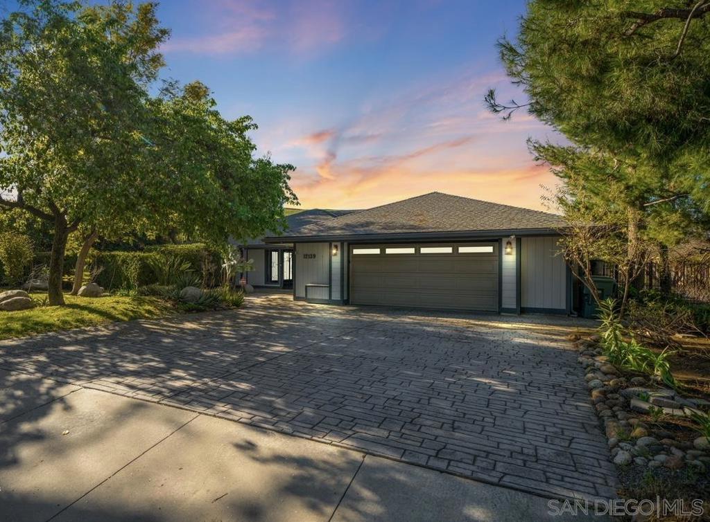 Welcome to an energy independent sanctuary in the exclusive Cattle King Estates where sustainable living meets timeless elegance. Set on a half acre lot, this updated from its original 4 bedroom, 2.5 bath estate offers 3,441 sq. ft. of refined living space designed for both comfort and sophistication. A paid off solar system producing 120% of the home’s energy needs combines with three Tesla Powerwalls to deliver full home backup, near zero utility bills, and more than $150,000 in energy upgrades already included. Inside, mahogany hardwood floors, a chef’s kitchen, and expansive natural light create an inviting yet elevated ambiance. Outside, enjoy mature fruit trees, a tranquil garden, and a covered patio overlooking the private pool. A water efficient drip irrigation system ensures minimal upkeep while the landscape flourishes year round. This rare offering blends smart technology, sustainable luxury, and serene outdoor living in one exceptional property.