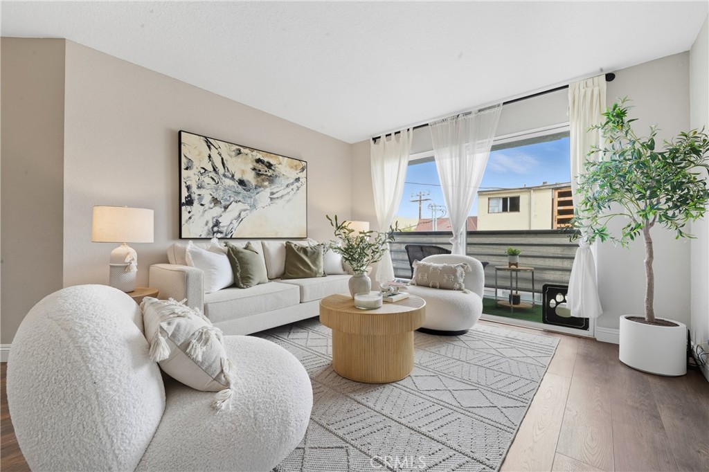Discover coastal elegance in this turnkey 2 bedroom, 2 bathroom condo, perfectly nestled in the vibrant heart of Downtown Long Beach. Just steps from sun kissed beaches, trendy boutiques, and top tier restaurants, this residence blends urban sophistication with serene comfort, offering an unparalleled lifestyle of convenience and charm. Perched on the second floor in a coveted section of the building, this unit ensures exceptional privacy and tranquility, insulated from street noise. The property welcomes you with beautifully landscaped front grounds and abundant guest parking, setting the tone for a warm and inviting community. Step inside to an airy, open concept floor plan that exudes modern elegance. The fully remodeled kitchen is a culinary masterpiece, featuring sleek quartz countertops, stainless steel appliances (included), soft-close drawers, custom pull-out cabinetry, and a chic dry bar with ample storage. This space flows effortlessly into the bright living area, which opens to a private patio; your personal oasis for morning coffee or gorgeous sunsets in the evening. Rich laminate flooring and textured ceilings create a refined ambiance throughout, complemented by three portable A/C units for year-round comfort. The primary suite is a serene retreat, complete with a ceiling fan, dual wall closets offering generous storage, and an ensuite bathroom with a shower/tub combo. The spacious guest bedroom features a large walk-in closet, while the second bathroom impresses with a walk-in shower, stylish tile flooring, and additional storage. A convenient hall closet provides even more space for effortless organization. Parking is seamless with two tandem spaces in the secure, gated underground garage, plus plentiful guest parking for visitors. Located moments from the beach, dining, entertainment, and the dynamic energy of Downtown Long Beach, this stylish condo is a rare opportunity to own a slice of coastal paradise in a prime location. Don’t miss your chance to call this gem home!