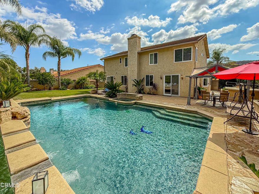 Set in the prestigious Fountainwood/Morrison community, this remarkable residence blends timeless style with modern updates across four bedrooms, four bathrooms, and more than 3,300 square feet of living space. Ideally situated within the award-winning Las Virgenes Unified School District, the home offers both sophistication and comfort for today's lifestyle.The interiors have been beautifully refreshed with brand-new flooring throughout the main level, creating a seamless flow between the elegant formal living and dining rooms, the inviting family room, and the well-appointed kitchen. Expansive windows and vaulted ceilings enhance the natural light, highlighting the home's open, airy ambiance.On the lower level, a private office and a bedroom with a full bath provide exceptional flexibility for guests, extended family, or those working from home. Upstairs, the generous primary suite offers a peaceful retreat, while additional bedrooms ensure space and privacy for all.The backyard is designed for entertaining and relaxation alike, with a large pool, spa, multiple patio areas, and mature landscaping that frame the home's outdoor living spaces. Beyond the property line, a private gate leads to a greenbelt park, extending the sense of space and serenity with direct access to nature.Additional highlights include newer HVAC compressors, meticulous landscaping, and a quiet neighborhood setting--all within minutes of scenic trails, parks, dining, and Malibu's beaches via Kanan Road.29251 Fountainwood Street is more than a home; it's a retreat. Where fresh, modern updates meet the charm of one of Agoura Hills' most desirable neighborhoods.