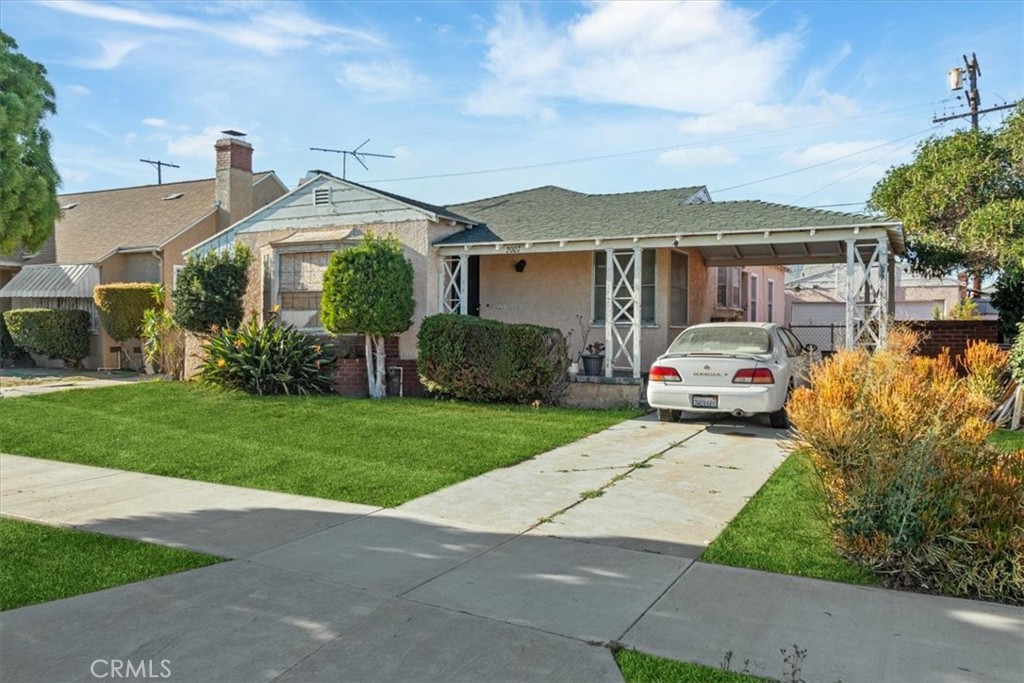 Welcome to 2007 W 94th Street, an excellent investment opportunity in one of Los Angeles’ most up-and-coming neighborhoods Gramercy Park. This 3 bed, 2 bath home offers classic charm and endless potential for the buyer with vision. Two car garage with a spacious living room featuring a fireplace and large windows. The property does need work and the currently listed price reflects this as it is listed well below comparable homes making it the perfect chance to customize, renovate, and build equity. The surrounding area is experiencing strong growth with new businesses, updated homes, and increasing community investment. Whether you’re an investor or a homeowner ready to take on a project, this is your opportunity to own in a thriving South LA neighborhood with fantastic upside in regards to equity and personalization. *Some photos have been edited in the front and backyard. Currently there is no landscaping.