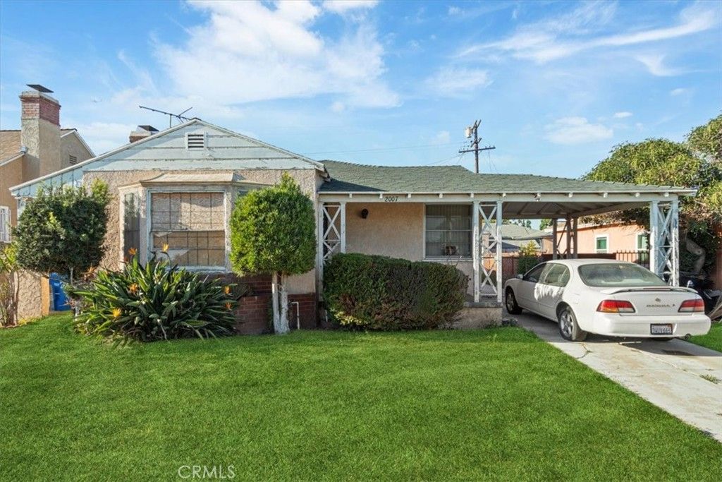 Photo of 2007 W 94th Street, Los Angeles, CA 90047 (MLS # SR25207216)