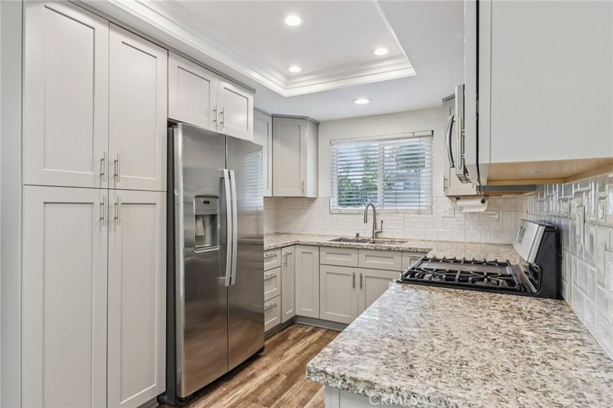 Located in the desirable gated community of Seneca Village, this updated 3 bedroom, 2.5 bathroom residence offers approximately 1,450 square feet of living space. The main level features an open-concept layout with natural light, luxury vinyl flooring, recessed lighting, and a cozy fireplace. The kitchen includes modern stainless steel appliances and abundant cabinet storage.



The spacious primary suite offers vaulted ceilings, a dual-sink vanity, and a private balcony, while the secondary bedrooms are well sized, including one with its own balcony. Additional highlights include in-unit laundry with washer and dryer, a two-car garage with shelving and storage, and a private front patio with built-in BBQ.



Community amenities include a pool, spa, and playground. Conveniently located near shopping, dining, entertainment, and major commuter routes including the 60 Freeway, this home blends comfort and convenience in a sought-after setting.



Check out the virtual tour to preview the property before viewing in person.