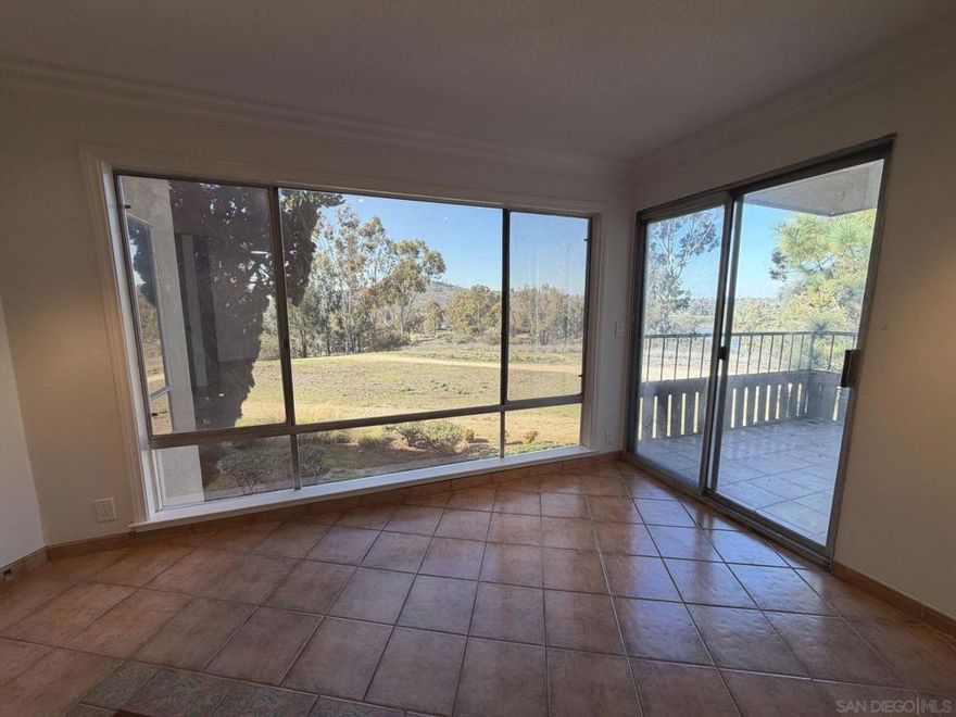 Enjoy stunning lake views from this desirable 2-bedroom, 2-bath condo in the sought-after Towers of Lake Park community in La Mesa. Located on the second floor, this bright and airy home features an open-concept layout with oversized windows and sliding glass doors showcasing unobstructed views of Lake Murray. Ready for your personal touch and priced below market!  The kitchen offers ample cabinetry, while the spacious primary suite includes a walk-in closet, private bath, built in cabinetry, and a Murphy Bed.  Relax on your private balcony and take in the peaceful scenery. Resort-style amenities include multiple pools and spas, fitness center, clubhouse, tennis and pickleball courts, and more. Just minutes to Cowles Mountain, Mission Trails, shopping, dining, and a nearby golf course.