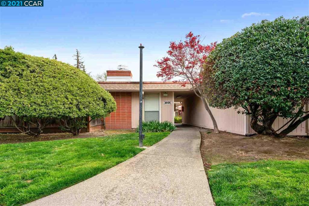 Wonderful, single-story, 3 bedroom, 2 bath, condo with laundry and walkable to Buena Vista elementary school. Spacious, open living with fireplace and separate dining area. Sunny kitchen with granite countertops. Hardwood flooring throughout. Primary bedroom with walk-in closet, ensuite bathroom, and access to the private courtyard. Enjoy 2 additional bedrooms and an updated guest bath. Full-size laundry hook-ups in-unit and hardwood flooring throughout. Two outdoor spaces to enjoy including an enclosed patio courtyard and a separate yard with a private gate to Alvarado. The community offers greenbelts and a swimming pool. Extra storage in the carport. Top rated Walnut Creek schools including walking distance to elementary school. Less than a mile to BART and freeways and only minutes to multiple shopping and restaurants options.