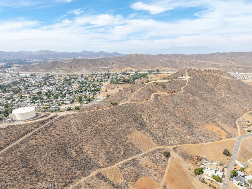 ***Attention Builders,Developers, Investors and MORE!!*** Don't miss out on this incredible opportunity to own this amazing parcel of land at 0 Ridge Road, Lake Elsinore (APN 373-132-046). This wonderful lot provides an abundance of potential options. Also enjoy this great location, in proximity to Lake Elsinore, freeways, shopping, schools, parks, recreational amenities, and SO MUCH MORE!! In addition, this parcel can be sold seperately, or can also be sold with adjacent parcel APN (373-132-047), See LISTING ID: IV25138648 - Schedule your showing today while it is still available!