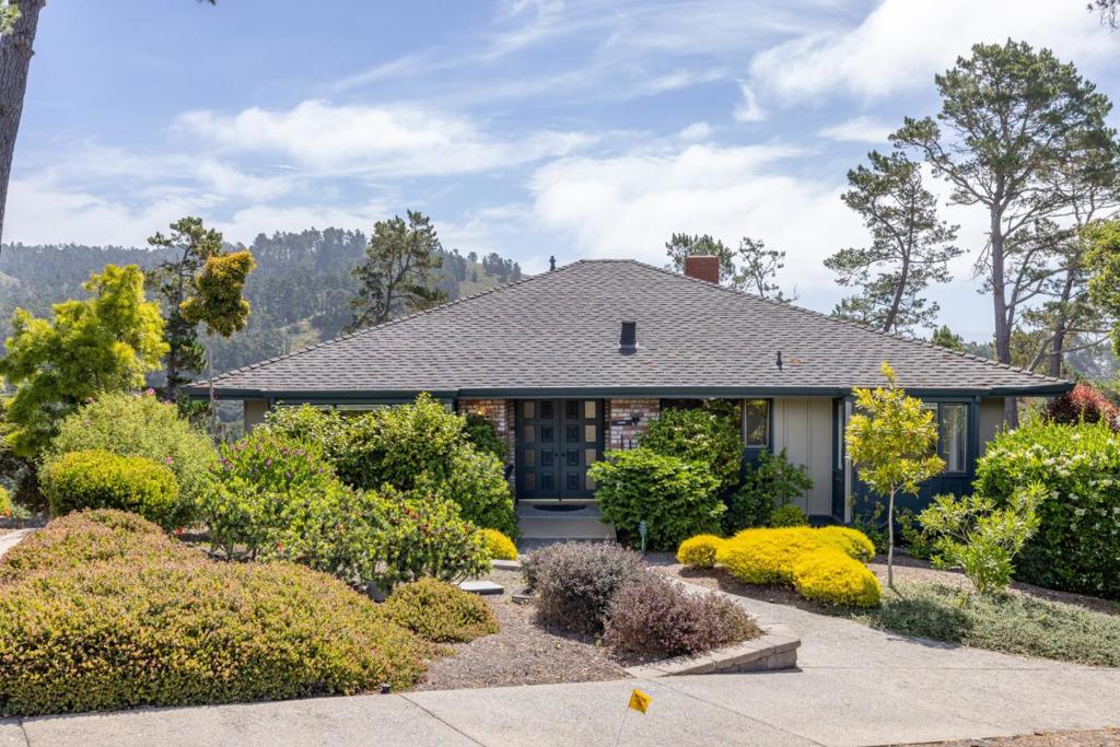 Welcome to this exceptional single-level residence in the coveted Del Mesa Carmel community. A rare freestanding C model, this 2-bedroom, 2-bath home is bathed in natural light, showcasing sweeping forest and mountain views through expansive windows. The open-concept living and dining areas flow seamlessly, anchored by a warm gas fireplace that invites relaxed, elegant living. A versatile den provides the perfect space for a home office, creative studio, or guest retreat. Step out onto a generous private deck, ideal for morning coffee or sunset gatherings, while taking in the serene natural surroundings. Perfectly positioned on the edge of the community, away from the road making it exceptionally private and quiet. While simultaneously being just moments from Del Mesas premier amenities, including the renowned Woodys Restaurant, heated pool, spa, fitness center, and a dynamic calendar of social events. Del Mesa Carmel is one of Californias most desirable 55+ communities, offering 24/7 gated security, on-site maintenance, and a true lock-and-leave lifestyle. Just minutes from Carmels world-class dining, golf, art galleries, wineries, and the stunning coastline. Move in and enjoy immediately, or bring your vision to transform this home into your personalized sanctuary.