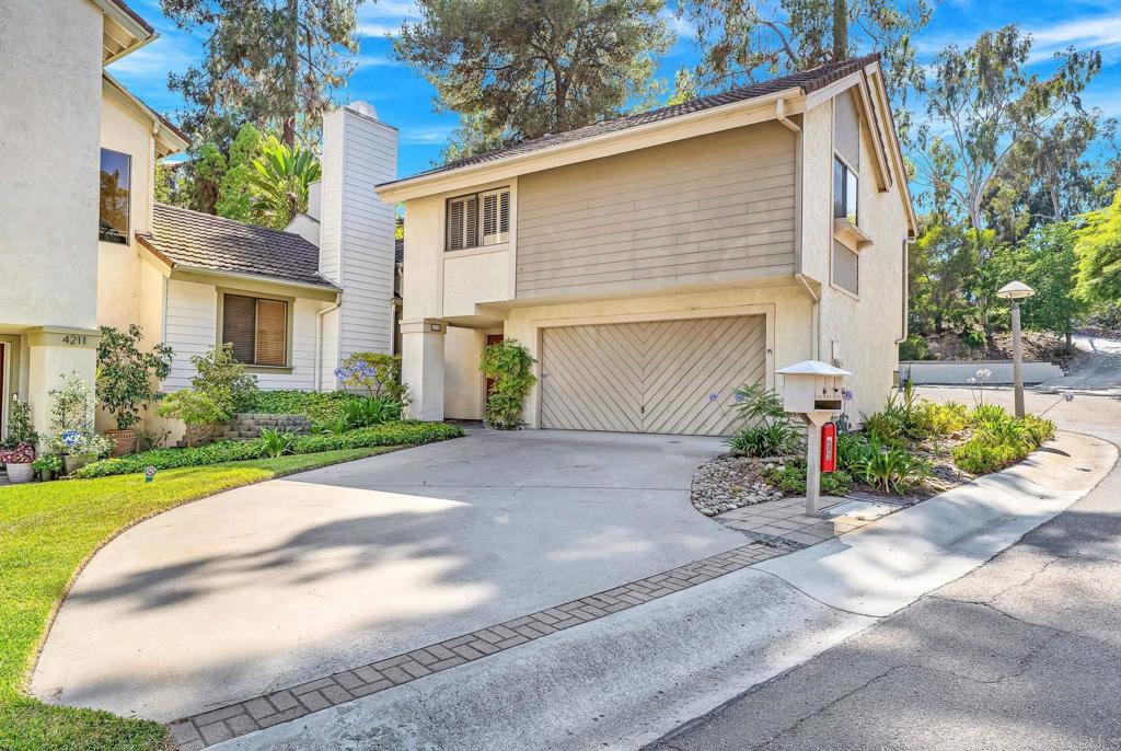 Beautiful home in Kensington Park Villas, gated community, offers peace and quiet, nestled deep in this well-maintained, securely gated community, walking distance to restaurants, bars, coffee shops in the village of Kensington. Featuring 3 bedrooms, 2.5 bathrooms, soaring ceilings with tons of natural light, a 2-car garage with ample additional storage, and tons of guest parking just a few feet away, new flooring in bedrooms, and new paint throughout, this home has everything you could want or need. Brand new French doors open up to a private patio in the forest-like setting. The community features two pools, a clubhouse, gated entry, beautifully maintained common areas, and more. Truly one of San Diego's best kept secrets!!