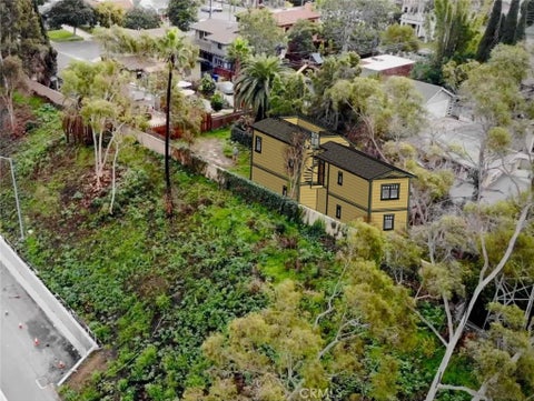 Photo of 2418 10th Avenue, Los Angeles, CA 90018 (MLS # TR26225367)