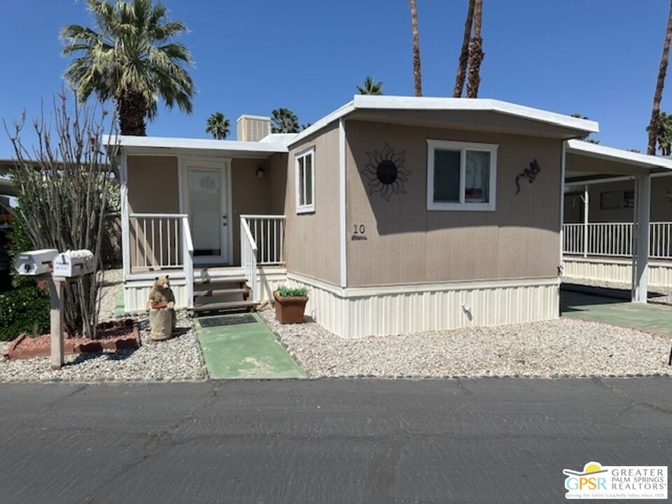 Available to tour weekdays, A well-maintained vintage manufactured mobile home, this 2-bedroom, 2-bath property features a spacious living room, an open kitchen with a breakfast counter, cabinets, pantry, and mountain views over the kitchen sink. There's also a formal dining room in a separate bump-out area off the living room. The home includes a California Sun Room with a buffet cabinet, deep freezer, additional refrigerator, and barbeque pit. An addition at the rear of the primary bedroom has a bathroom and laundry room. The private, partially enclosed backyard is furnished with a gazebo, heat lamps, and a tabletop heater. The home has new skirting, stairs, handrails, and a double roof with insulation. The backyard features a shaded patio, swamp cooler, two window air conditioners, and insulation. There are sheds, a workshop with tools, and additional outdoor space for an office or artist's studio. The property also includes Meyer lemon and orange trees. The community offers amenities such as a pool, jacuzzi, shuffleboard, ping-pong, piano, pool table, card table, community room with a kitchen, and an adjacent ballroom with a stage and banquet kitchen. Tramview is a 55+ senior community with a space rent of approximately $915/month. The Park Pre-Sale Inspection has been completed and approved, and all seller repairs have been completed, making the home ready for occupancy. The community is centrally located between Palm Springs, Rancho Mirage, and other cities, with Palm Springs International Airport 15 minutes away and the Amtrak Train Station 20 minutes away, offering free overnight parking. The property is sold as-is, and buyers and their agents are encouraged to perform due diligence. This home is lendable and insurable. For a private tour and to initiate negotiations with the seller, please do not hesitate to reach out.