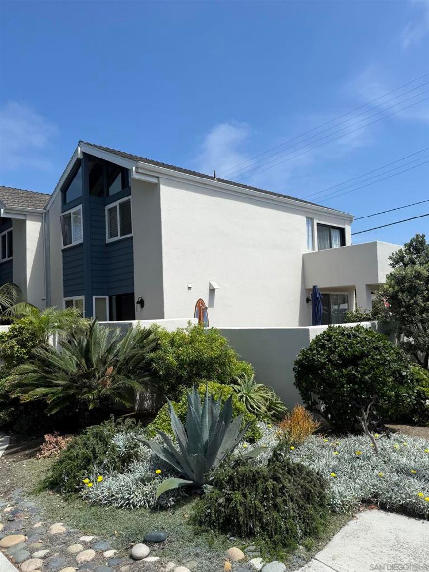 Furnished Luxurious Beach Colony Townhome, offers 2 bedrooms and 2.5 bathrooms with 1,200 sq ft of living space. Recently remodeled very high end. Also it features AC, Laundry room, a private yard ideal for entertaining and a balcony with partial ocean views. The unit includes a one-car garage and an additional parking spot. Located just steps from the Sand!