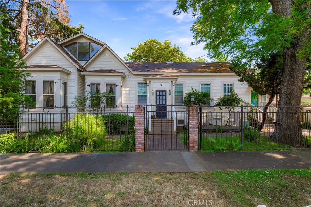 Fantastic Investment Opportunity in the Heart of Downtown Chico! This unique property is full of charm, character, and architectural appeal—all set on a desirable corner lot just steps from local restaurants, shops, parks, and the farmers market. The building is divided into five distinct units: a spacious 2-bedroom, a 1-bedroom, and three private-entry studios—each offering its own personality and layout. Two of the units have been tastefully updated, with one featuring the added convenience of in-unit laundry. The standout two-bedroom unit showcases a two-story layout with a spiral staircase, fireplace, and a private exterior balcony—perfect for enjoying morning coffee or relaxing in the evening. Outside, a large yard with raised decks provides space for gatherings, barbecues, or simply enjoying the shade of mature trees. Brick and concrete walkways, along with wrought iron, brick, and wood fencing, add both charm and privacy. This is a rare chance to own a one-of-a-kind multi-unit property in Downtown Chico—a location that continues to attract high rental demand. Whether you’re expanding your portfolio or diving into real estate investment, this property offers both income potential and timeless appeal.