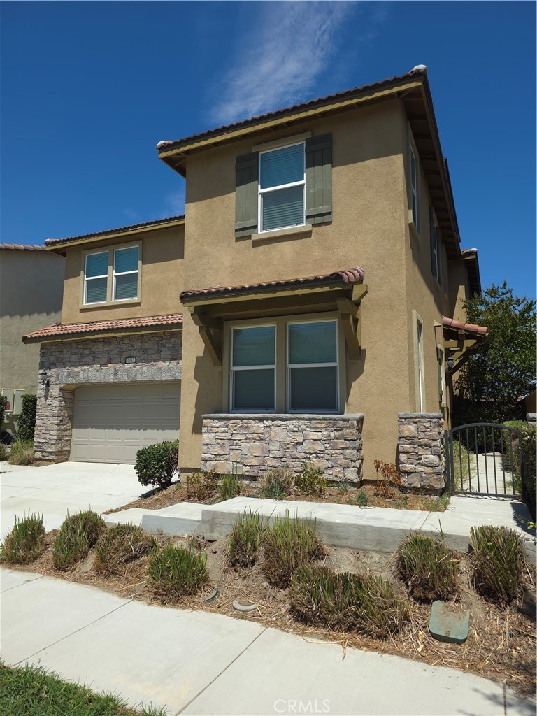 Welcome to 4957 S. Tangerine Way—a modern 4-bedroom, 3.5-bathroom home with a spacious loft, situated on a premium lot with no rear neighbors in the highly desirable Park Place community of Ontario Ranch. This well-maintained residence offers 2,441 sq ft of modern living space, featuring a bright and open floor plan, a gourmet kitchen with granite countertops and stainless steel appliances, and a downstairs guest bedroom with a private full bath. Upstairs, you'll find a large primary suite with an en-suite bathroom and walk-in closet, two additional bedrooms, a full bath, a convenient laundry room, and a versatile loft ideal for a second living area, office, or playroom. The home also includes a professionally landscaped yard with a covered patio, perfect for relaxing or entertaining in a private setting with no rear-facing neighbors. An attached 2-car garage is pre-wired for EV charging. Residents of Park Place enjoy resort-style amenities including a clubhouse with pool and spa, fitness center, business center, theater room, tennis and basketball courts, playgrounds, dog parks, and scenic walking trails. The community is beautifully maintained and known for its welcoming atmosphere and year-round neighborhood events. Located in the heart of Ontario Ranch, this home offers close proximity to new schools, retail centers, restaurants, and major freeways (60, 15, 71, 91). It’s just minutes from Ontario International Airport, Ontario Mills, and Victoria Gardens—making it a prime location for convenience and lifestyle. Offered at $3,500/month and available for immediate lease. Don’t miss this rare opportunity to live on one of the most private lots in the community! Truly a must see to appreciate! Showing will be held for one day only: Saturday, August 16, 2025, between 1:00 PM to 4:00 PM.