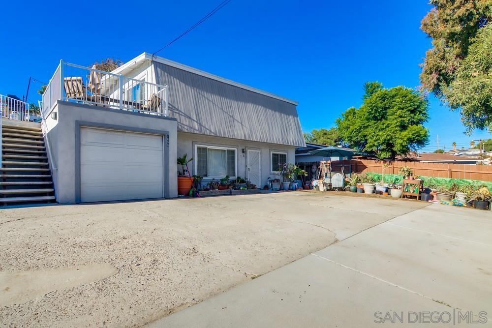 Super sweet duplex in excellent Lemon Grove location. Run the projected numbers on these as the math looks good! Each unit has its own garage with laundry, plus other off street parking options. Upper unit has large private deck, and both units have access to huge back yard. (More than enough room to add another unit, if allowed.) Long term excellent tenants pay well below market rents. Lots of upside improvement opportunity here. These are a great opportunity for the savvy investor or first-time buyer. VA financing welcome. Exterior: Wood/Stucco Sewer: Sewer Connected Unit # for Unit 1: 1890 Unit # for Unit 2: 1892 Number of Furnished Units: 0 Topography: GSL