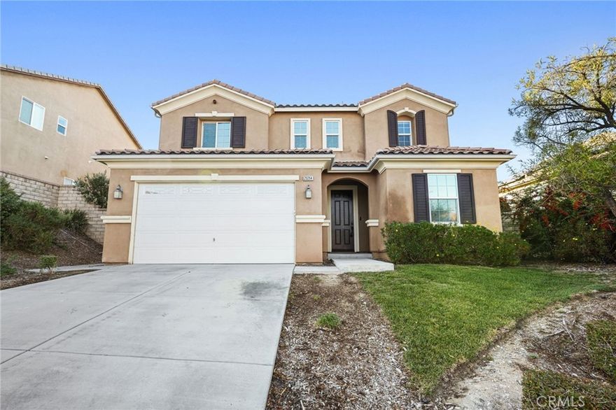 Modern View Home in Prime Santa Clarita Neighborhood.  Welcome to 20264 Dorothy St., a beautiful move in ready four-bedroom home with PAID SOLAR!  This spacious and elegant residence offers a perfect blend of comfort, style, and functionality.  Step inside to a bright, open floor plan featuring bamboo flooring, soaring ceilings, and plenty of natural light. The large formal dining area flows seamlessly into the expansive living room, creating an inviting space ideal for entertaining. The gourmet kitchen boasts an oversized island with marble countertops and ample cabinetry, perfect for any home chef.  Downstairs, you’ll find a bedroom and a full bathroom, ideal for guests or multi-generational living. Upstairs features new carpet throughout, a generous loft, and two additional bedrooms that share a beautifully appointed hallway bath with dual sinks.  The primary suite is truly a retreat, offering stunning views, an oversized soaking tub, a separate shower, dual sinks, and a massive walk-in closet with windows that fill the space with natural light.  The backyard is designed for low maintenance and enjoyment, featuring artificial turf, large cemented area that is perfect for relaxing or entertaining outdoors.  With fresh interior paint, new carpet, paid solar and a contemporary design, this home is move in ready and waiting for its next proud owner.