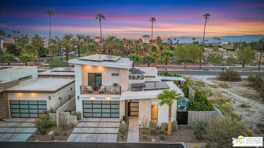 Located in the popular Vue community, this home sits on one of the largest lots in Vue. This luxurious 3 bed (all ensuite)/3.5 -bath home offers 2,319 square feet of well-planned living space with thoughtful details throughout. The owner spared no expense; incorporating over $300,000 in upgrades.  The ground floor primary bedroom offers a luxurious retreat with spa-quality bath and dual closets. The kitchen is for the discerning cook, featuring upgraded appliances and bonus features like wine fridge and beautifully built-out pantry.  The detached casita will provide a great place for your guests to stay and relax with some privacy. Because this home is situated on a larger lot, the owner was able to put in a larger pool and add a custom outdoor kitchen with grill, ice maker, fridge, and pizza oven. The outdoor space is perfect for entertaining friends with custom seating around a cozy fire pit for those relaxing evenings. The dual pool heater gives you the option of heating by gas or electricity. The rooftop deck comes with its own beverage refrigerator, perfect for watching our beautiful sunrises and mountain sunsets or just enjoying the view. With 60 owned solar panels, you won't fear those summer AC bills. Plus, in the air-conditioned garage, you'll find EV charging for added convenience. The gated community provides security and peace of mind while keeping you close to downtown and the airport.This home is being offered fully furnished down to the housewares, linens, and electronics and yes, even gym equipment. No need to worry about buying furniture or decorating just bring your suitcase and start enjoying desert living right away.