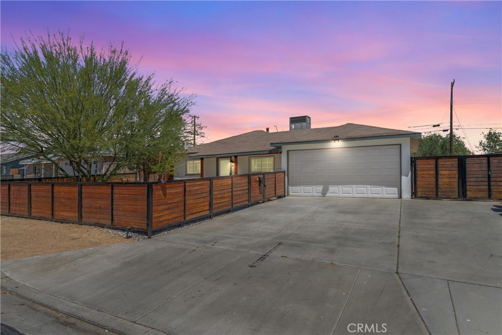 Welcome to this beautifully maintained, single-story 2-bedroom, 1-bathroom home located in the desirable Palmdale community. Set on a spacious 7,060 sq ft lot, this 804 sq ft residence blends comfort, style, and convenience perfect for first-time buyers, downsizers, or investors.
The exterior boasts great curb appeal with a fresh coat of paint, newer fencing, and low-maintenance, desert-friendly landscape. An automatic front yard sprinkler system and energy-efficient windows throughout add practicality and eco-conscious appeal. A smart fingerprint lock on the front door and Blink camera system enhances security.
Step inside to find a thoughtfully updated interior with an open-concept layout. The living room flows seamlessly into a bright, modern kitchen featuring ample cabinetry, generous counter space, bar seating, and sliding doors that lead to a large backyard ideal for entertaining or designing your dream outdoor space.
Both bedrooms are light-filled and generously sized, and the updated bathroom includes a walk-in shower and contemporary fixtures. Additional updates include all new flooring throughout, newer HVAC system, LED lighting, updated cabinetry and counters, freshly painted interior, and whole plumbing repipe.
Conveniently located near public transit, major freeways, parks, shopping centers, and the Antelope Valley Mall, this move-in ready home offers the perfect blend of modern living and accessibility.