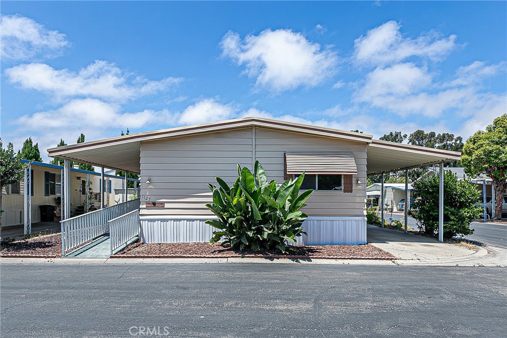 Welcome to 1127 Via Contento! This freshly remodeled 2-bedroom, 2-bath mobile home is located in Casa Del Rio, a well-maintained community that offers modern comfort with a warm, inviting feel. Recent upgrades include new flooring, updated kitchen and bathrooms, fresh interior and exterior paint. The open floor plan is perfect for relaxing or entertaining, and the spacious covered patio provides a great space to enjoy your morning coffee or evening breeze. This home is also conveniently situated on a corner lot for added privacy. Enjoy the peaceful surroundings of the community, which features amenities like a clubhouse, pool, and organized activities. Conveniently located near shopping, dining, and medical facilities, this home offers both comfort and convenience. Don't miss this move-in-ready gem - schedule your tour today!