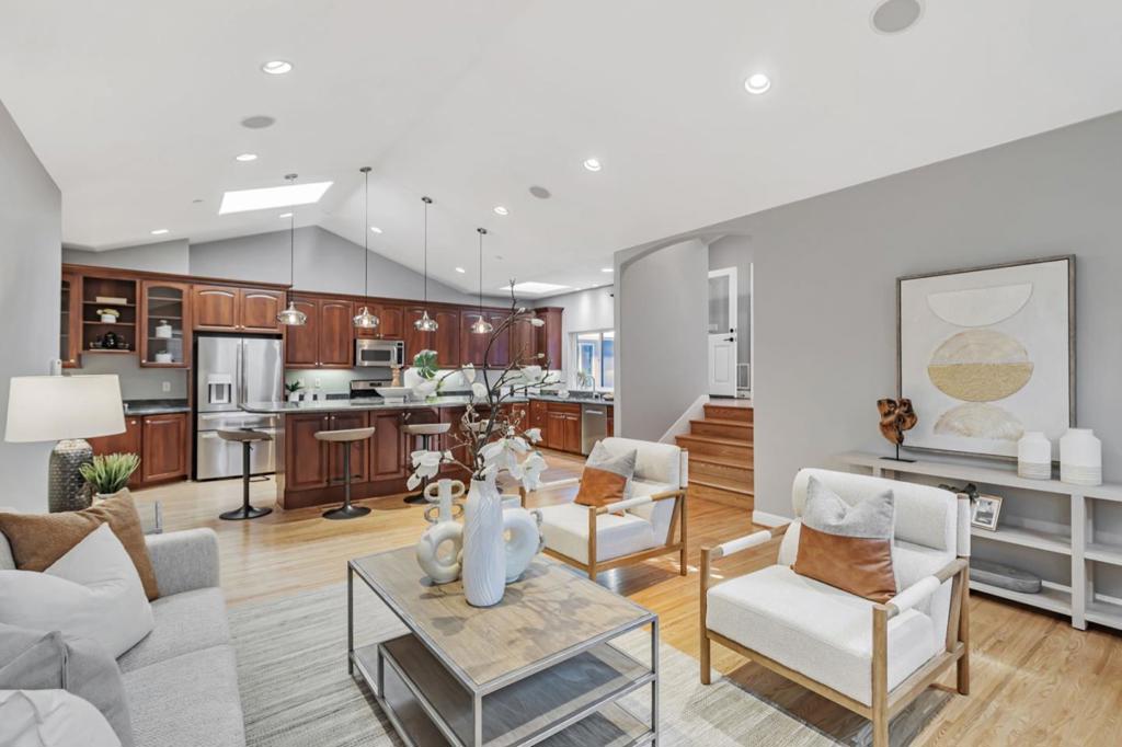 Magnificent 5-bedroom estate located in the highly desirable neighborhood. As you step inside, you are greeted by an abundance of natural light pouring through a huge picture window, illuminating the elegant living room & dining area. The heart of the home is the open chefs kitchen and great room combo with a vaulted ceiling, skylights, high-end cabinets, granite countertops, massive kitchen island, surround sound for 3 TVs, perfect for both luxury daily living and grand-scale gatherings. The secluded master suite completed with a den, spacious bathroom with a bathtub for ultimate relaxation. On the opposite side of the home, a separate wing has 4 bedrooms, 2 with en-suite, hallway bathroom with a jacuzzi, providing privacy and ample space for a large family or guests. Sprawling over 14,000 sf lot. One-of-a-kind backyard has an amazing cascading river waterfall that leads to the top of the hill with a panoramic view of the Bay. At the top is a venue features a Disneyland-inspired bar, TV, BBQ grill, a kitchen with a microwave, 2 refrigerators, a hot tub and even a toilet. Ideal location midway between San Francisco and Silicon Valley. This highly loved home is your personal sanctuary and the ultimate venue for hosting unforgettable events with views that will capture your heart.