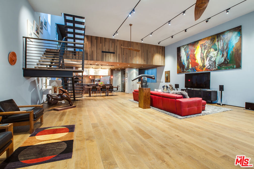 DEVELOPERS OWN HOME: This 3120 sqft truly unique 3 bed / 2.5 bath loft style home, built in 2017 and designed by top Venice architect. The home boasts top of the line finishes with exceptional living areas, centered around a 1400 sqft Great Room, with soaring 15 ft high ceilings and mahogany floors, leading into the gourmet kitchen, with 400 bottle wine storage. This is a truly amazing entertaining space. The lower level comprises 2 bedrooms and a study, while the master suite is on the top floor and has a Euro-style bathroom with a 2 person Jacuzzi. The huge roof terrace with fire pit, barbecue and lots of greenery is great for al fresco entertaining and enjoying the sea breezes and views. The property is back off the street and very quietly situated, finally there is parking for 2 cars. A fabulously appointed, very private property in great Venice location. AN EXCEPTIONAL HOME FOR EXCEPTIONAL PEOPLE.