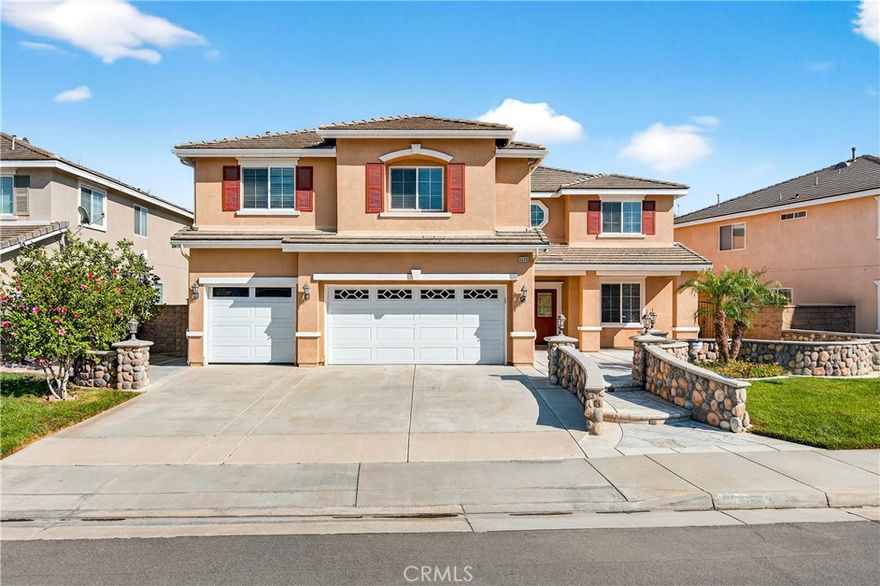Nestled in one of Eastvale’s most desirable neighborhoods, this stunning 5-beds, 4-baths home with an office and a giant loft combines modern luxury with timeless elegance. From the moment you arrive, you’ll be impressed by this home’s stunning curb appeal. Natural stone-accented steps, framed by gracefully curved walls, create a grand approach to the entry. A spacious, fully finished front patio, manicured landscaping, and an elegant double-door entry set the perfect tone for the refined living that awaits inside. Step into a grand foyer with soaring ceilings, a dazzling chandelier, and a beautifully appointed formal living and dining area accented with Roman style columns. Rare German Stiltz home lift adds unmatched convenience. The open-concept gourmet kitchen features granite countertops, stainless steel appliances, a walk-in pantry, and a center island, flowing seamlessly into the cozy family room with fireplace and a sunny breakfast nook. A first-floor bedroom with a full bath is ideal for guests or in-laws, complemented by a powder room and a versatile bonus room that can serve as a home office, a gym, a game room or an enclosed bedroom. Upstairs, a spacious loft provides the perfect space for entertainment or relaxation. The luxurious master suite boasts a private retreat area, dual walk-in closets, double sinks, a walk-in shower and a tub with jacuzzi spa. Three additional bedrooms with one having direct access to the bathroom are generously sized and filled with natural light. A convenient upstairs laundry room completes the second level. Enjoy the best of California living in a beautifully designed backyard featuring a covered patio, built-in BBQ area, and a charming garden with fruit trees accented by natural stone. Perfect for hosting gatherings with family and friends. Additional highlights include elegant wood and marble flooring throughout, detailed crown molding, first floor home theater speakers, a whole-home water softener system, whole house rain-gutter and the convenience of a spacious three-car garage. Centrally located near top-rated Eastvale schools, shopping centers, Ontario Mills Outlets, and just minutes from Ontario International Airport, with easy access to the 15, 60, and 10 freeways. This rare opportunity offers the very best of Eastvale living—a true must-see!