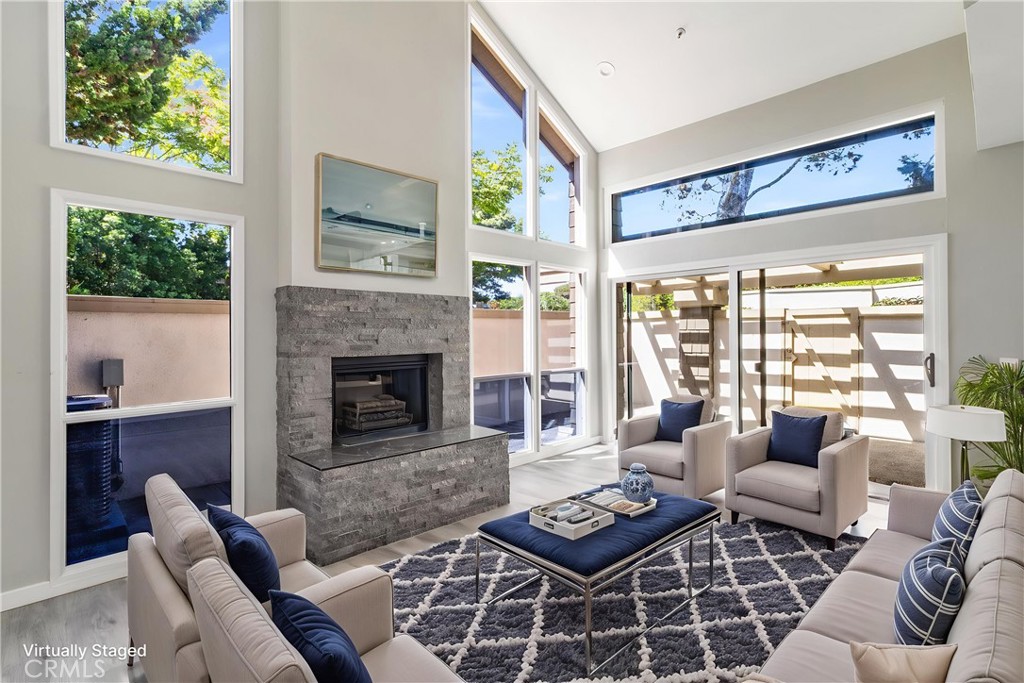 This stunning 3-bedroom, 2.5-bath residence has been fully upgraded with designer finishes throughout, offering both style and comfort in the exclusive Big Canyon community.
Step inside to a light-filled open layout featuring a completely remodeled kitchen with Carrera Quartz countertops, elegant backsplash tile, and an LG stainless steel appliance suite. The spacious dining area flows seamlessly for both entertaining and everyday living.
Conveniently located on the main level is a full bedroom and bathroom. Upstairs, the primary suite is a true retreat, boasting vaulted ceilings, oversized closets, and a spa-inspired bathroom with a rain shower, freestanding soaking tub, heated towel rack, double-sink vanity with abundant storage, and illuminated mirrors. The secondary bedrooms are generously sized, and all bathrooms have been thoughtfully renovated with high-end finishes and modern touches.
Enjoy indoor-outdoor living with a large enclosed patio perfect for relaxing or entertaining. The Big Canyon community offers exceptional amenities, including two pools with scenic views, two hot tubs, and a tennis court. There are also 2 spaces available in the gated parking garage. Its prime location places you moments from Fashion Island, Balboa Island, the Back Bay Sea to Sky Trail, and pristine Newport beaches, with easy access to freeways and the highly regarded Newport Mesa School District. Limit to one small pet.