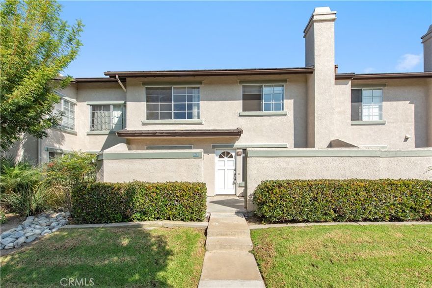 Walking Distance to UCI & University High School! The largest floor plan in the desirable University Town Center community. This spacious home features two master suites upstairs, each with its own private bath, plus a convenient half bath downstairs. Enjoy a bright and open layout with a large living room and cozy fireplace, along with recently upgraded flooring downstairs. A gated, enclosed patio opens to a lush greenbelt and leads to your private front door. Two covered carports and extra storage space are included. Community amenities at Columbia Square include a swimming pool, BBQ area, basketball court, sand volleyball court, and playground. Zoned for award-winning schools, including University High School, and just a short walk to UCI, grocery stores, and restaurants.