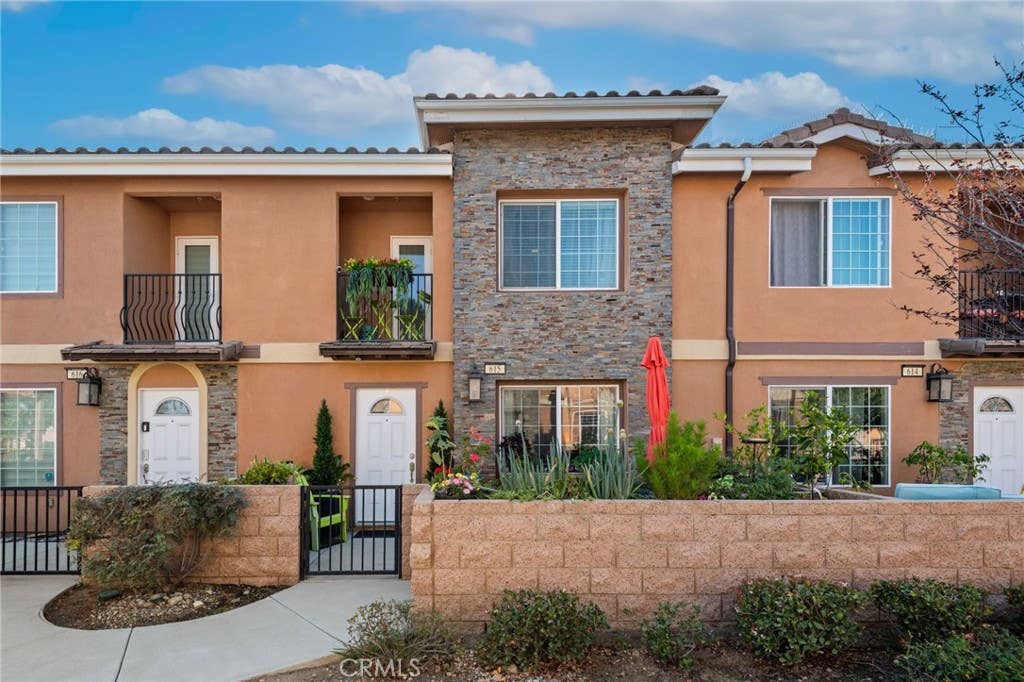 Photo of 16408 Valencia Avenue #615, Fontana, CA 92335 (MLS # SW26118385)