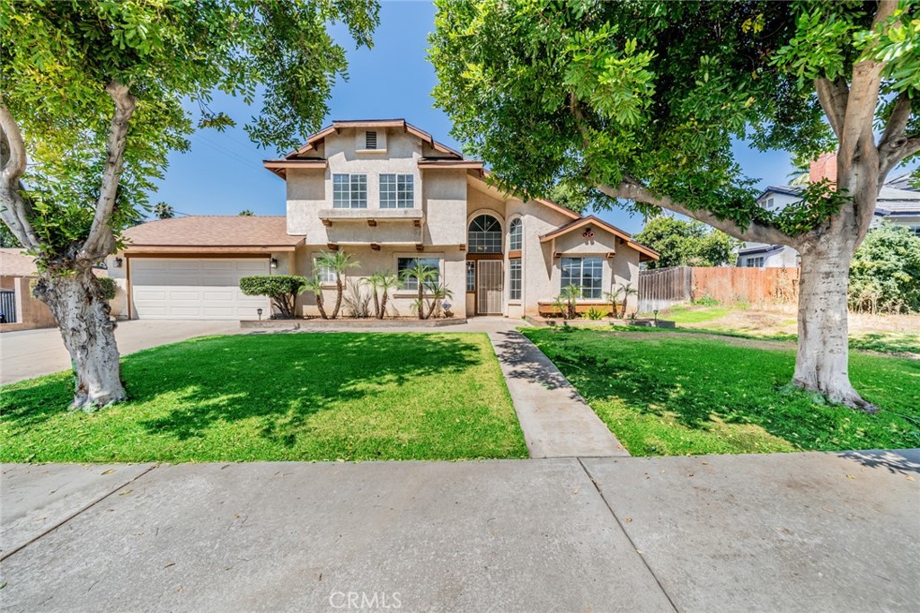 Welcome to 1414 N Acacia Ave, a spacious and well-maintained two-story home located in a quiet residential neighborhood of Rialto. This single-family residence offers 4 bedrooms, 3 bathrooms, and 1,765 sq ft of living space on a generous 8,400 sq ft lot.
The home features a central cooling system, gas heating, and a cozy wood-burning fireplace in the living area. The kitchen is equipped with granite countertops, perfect for everyday cooking and entertaining. All bedrooms are generously sized, and the layout includes a mix of private and shared spaces ideal for families.
