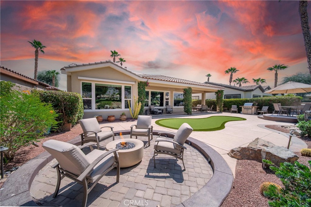 Welcome to Casa Puesta del Sol, a beautiful 3-bedroom, 3-bathroom home in the sought-after Trilogy at La Quinta community, where desert luxury meets everyday comfort. The spacious Monarch floor plan features a bright, open layout with elegant tile flooring throughout the main living areas. The great room, complete with a cozy gas fireplace, is ideal for cool desert evenings, while large west-facing windows frame stunning views of the Santa Rosa Mountains and the golf course.
The gourmet kitchen comes fully equipped—with appliances including a coffee maker, espresso machine, slow cooker, blender, and more—making it easy to prepare anything from a quick breakfast to a dinner party. A dedicated office with a desktop computer and printer offers the perfect space for remote work or quiet reading.
Each bedroom is generously sized, with the primary suite offering an en-suite bath with dual vanities and a luxurious shower. A private casita provides guests with their own comfortable retreat, complete with TV, storage, and full bathroom.
Outdoors, you can practice on the backyard putting green, relax under the retractable shade in the master bedroom, or gather around the fire pit and gas barbecue for sunset evenings.
As a guest, you’ll enjoy access to Trilogy’s resort-style amenities—including multiple pools and hot tubs, a bocce ball court, pickleball and tennis courts, a well-equipped fitness center, Café Solaz, and the on-site Coral Spa.
Whether you’re seeking a winter getaway or year-round living, Casa Puesta del Sol offers the perfect blend of leisure, convenience, and luxury.
Security Deposit: A refundable security deposit is required and will be collected prior to your stay. Full details provided upon booking.
For long-term rentals, a California lease must be signed, and each rental includes utility caps for electricity, water, and gas.