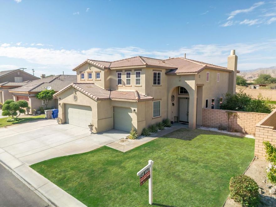 MOTIVATED SELLER! Stunning 5BD/3BA home in the gated Talaveras community of Indio. Recently updated with new floors, modern kitchen, and custom staircase. Features a brand-new pool with water features (June 2024), RV parking, artificial turf, polarized windows, and new water heater. Spacious master suite with jet tub. Guard-gated security, seven community parks, and low HOA--truly a must-see!