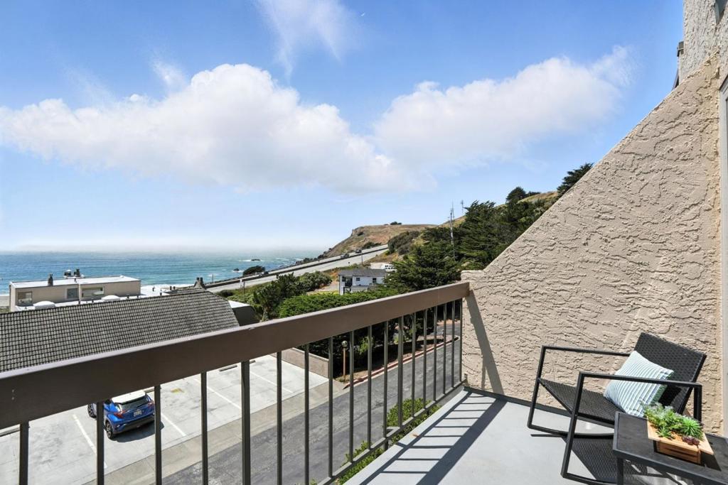 PRICE REDUCED! Great beach home with white water, ocean views from all rooms! Inside this 2-level home there is a spacious foyer to greet your guests, with luxury vinyl flooring upstairs, plush carpet downstairs in bedrooms and hallway. Brand new double-pane windows throughout the home and both bedrooms have private baths connected, (the 3rd bath is upstairs, for guests). Updated kitchen includes quartz counter tops, stainless steel appliances, an eat-in-kitchen, as well as quartz counter top bar between kitchen and dining area and a sizable pantry closet. Updated bathrooms have new vanities, toilets and shower doors. Two-car, private, detached garage with automatic garage door. Near to transportation and multiple shopping areas.