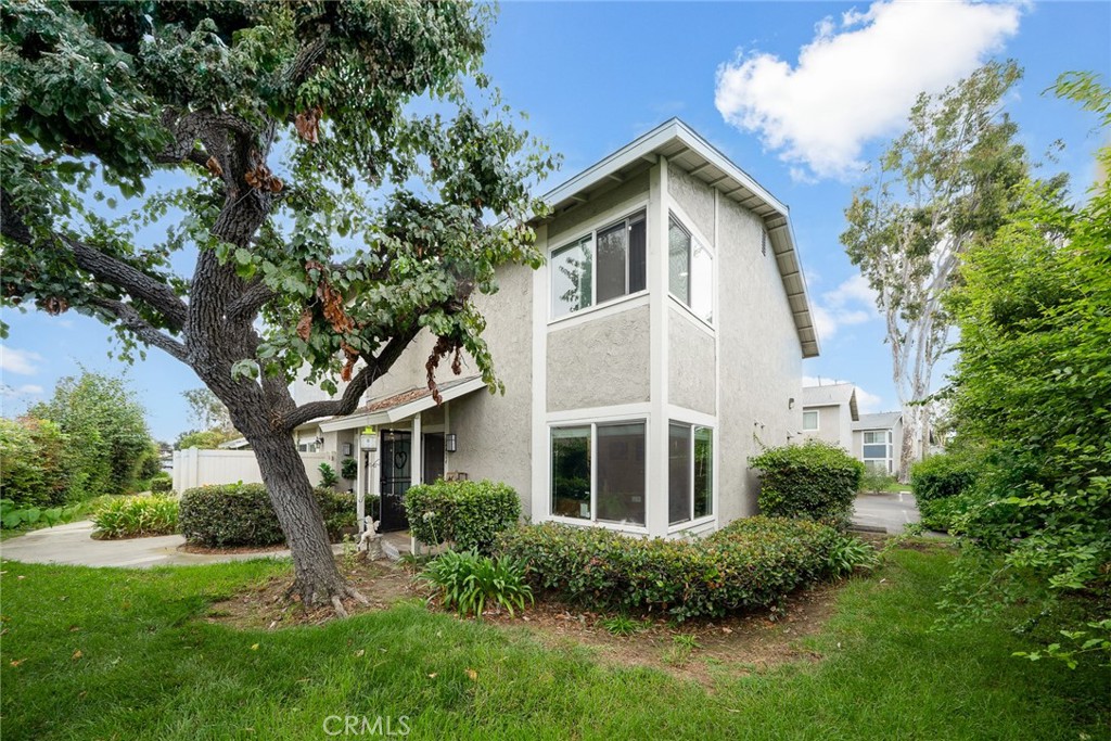 Welcome to this fully renovated home in the highly desirable South Coast Metro area. This 3 bedroom 1.5 bathroom home boasts vinyl flooring, updated central HVAC and modern finishes throughout. Step inside and be met by a cozy living room offering a great space for relaxation. Nestled in the hall is a half bath, perfect for guests. Beyond it are the open kitchen and adjoined dining area which offers natural light via a patio slider. White shaker style cabinets, designer lighting fixtures, glass tile backsplash, quartz counters, and a butcher block peninsula complete with a breakfast bar are some of the amazing features found in the kitchen. Tucked away in the kitchen is the shared pantry + laundry closet with storage shelves. Enjoy a quaint paved backyard with a small artificial turf area. The second level showcases the master bedroom, two guest bedrooms, and a shared full bathroom. The garage features storage cabinets with epoxy flooring. Tranquil and well-maintained, the HOA community has great amenities such as a basketball court, a large sparkling pool, and a relaxing jacuzzi.