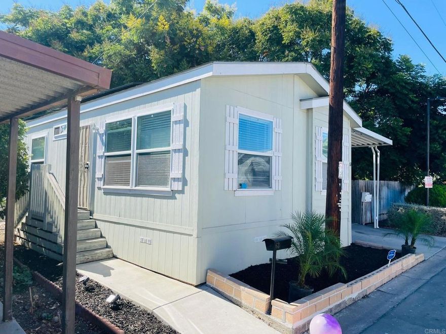 Discover this beautifully updated mobile home conveniently located just 10 miles east of downtown San Diego. 2 miles from grocery stores, shopping, restaurants and the I-125 Freeway. This residence features: New laminate flooring throughout, freshly painted exterior, updated ceiling fans and light fixtures, brand-new windows, and much more. Enjoy access to the community amenities, including a pool, jacuzzi, and event room. Don’t miss this fantastic opportunity in a desirable location at an unbeatable price.... a must-see today!
