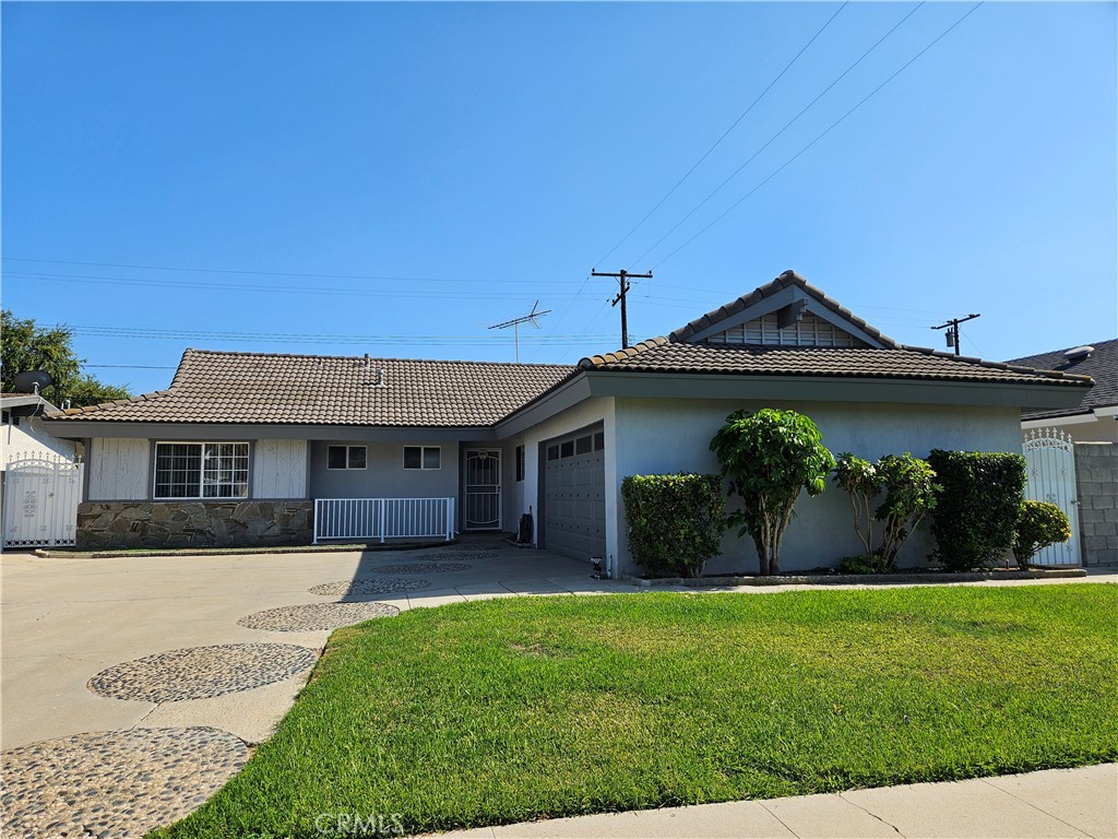 If privacy and serenity are important to you, look no further! Nestled in a quite neighborhood, this 3 bedroom 1 full bath and 1 - 3 quarter bath one- story home is one you'll love to come home to every day. This home has new flooring throughout the house; the kitchen was renovated with new cabinets, a new dishwasher and a new stove one year ago. All rooms have ceiling fans. The washer and dryer in garage are included in the lease. An insulated two-car attached garage. There is 1,374 square feet of living space and additional enclosed patio room that can be used as a den, office, bonus room or storage. The wide driveway allows extra parking space. The backyard is very private and fenced in, which is perfect for , kid's playing, relaxing and entertaining. The gardening service is included in the lease. Just south of Los Angeles, this Orange County home is conveniently located. It borders Fullerton, is only a few miles to Brea, and close to CSUF. Here's proof positive that one can downsize and still live large! This home is ready to move in. Schedule your viewing! One small pet (dog or cat) may be allowed. Size and breed restrictions may apply. Call for approval.