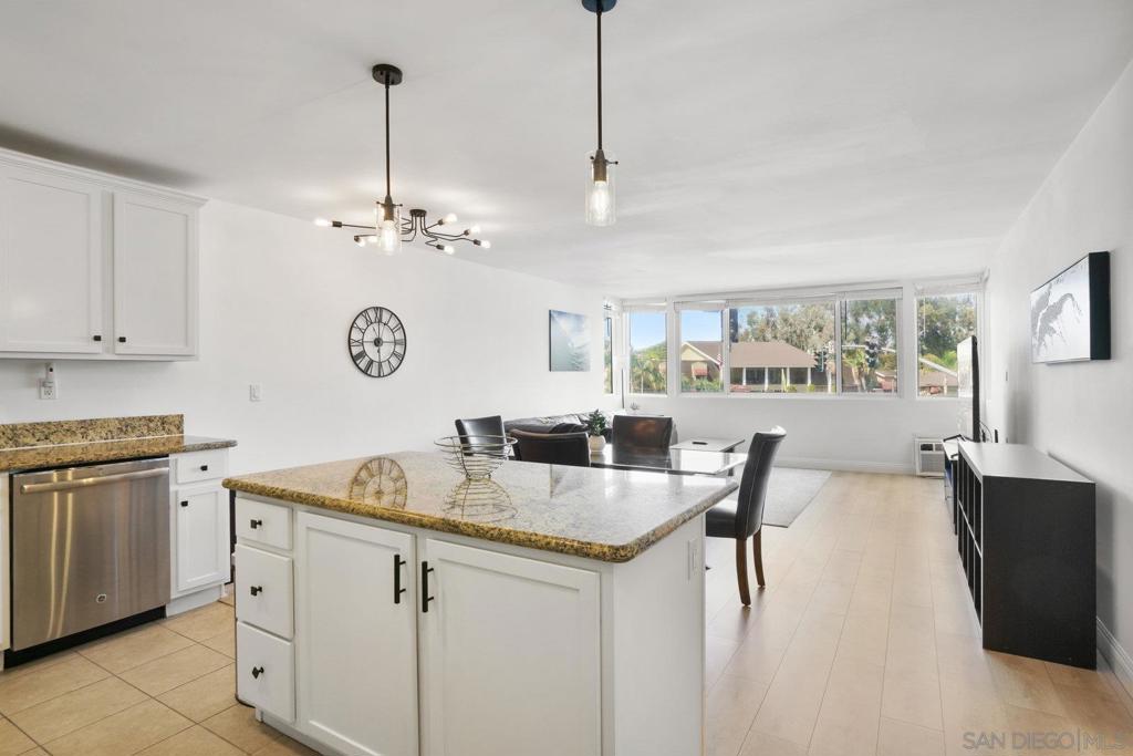 Welcome to 4501 Collwood Blvd Unit 4, a move-in-ready condo nestled in the heart of San Diego's vibrant 92115 neighborhood. This charming 2-bedroom, 2-bathroom home offers the perfect blend of classic character and modern convenience. Come inside and be greeted by a bright, spacious open floor plan that flows effortlessly. The kitchen has been thoughtfully updated with sleek countertops, modern cabinetry, and integrated appliances, making it a joy to cook and entertain in. The large living and dining areas are bathed in natural light, providing a warm and inviting atmosphere. Both bedrooms are generously sized and offer plenty of storage, with the master suite serving as a peaceful retreat complete with a private en-suite bathroom. An in-unit washer and dryer combo adds an extra layer of convenience. Outside, the community provides a serene escape, and you'll enjoy the added bonus of two assigned parking spaces. Situated between the desirable neighborhoods of Talmadge and College West, this home puts you in the center of it all. You'll be just minutes from San Diego State University and have quick access to major freeways, making your commute and weekend adventures a breeze. This is more than a home; it's a lifestyle. Explore the eclectic dining, trendy cafes, and vibrant parks that define this dynamic community. Ready to see your new home?
