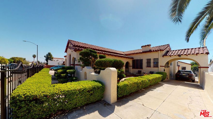 Two Homes on One Lot! Welcome to this beautifully preserved Spanish-style gem, featuring two character-filled homes on one lot, perfect for extended family living or investment potential. The main home features three spacious bedrooms and two bathrooms, showcasing classic architectural details rarely found today. Step inside the grand living room with soaring vaulted ceilings, bathed in natural light from large arched windows. The space is adorned with decorative pillars and original hardwood floors that add warmth and elegance throughout. Enjoy your morning coffee in the cozy breakfast nook surrounded by charm and character at every corner. Additional features include central heating and air, refrigerator, stove, and washer, dryer, combining old-world beauty with modern comfort. The second home, a delightful  two bedroom, one bath Spanish cottage featuring hardwood floors and abundant natural light. With wall A/C, washer/dryer hookups, a private 1-car garage, and a charming outdoor area, this home is both inviting and functional. Nestled in the heart of historic Boyle Heights, this property is ideally located near USC Medical Center, Keck USC, White Memorial Hospital, San Antonio Winery, Dodger Stadium, and beloved local shops and restaurants. This is more than a property; it's a piece of Los Angeles history, offering timeless architecture, versatility, and an unbeatable location. A must-see to truly appreciate its charm and character!