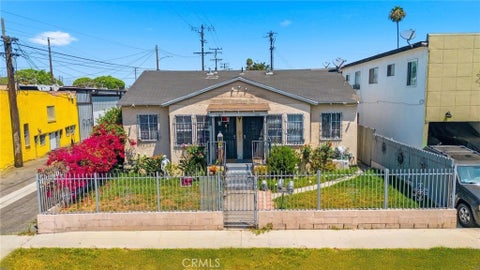 Photo of 1113 E 85th ST, Los Angeles, CA 90001 (MLS # MB26185601)