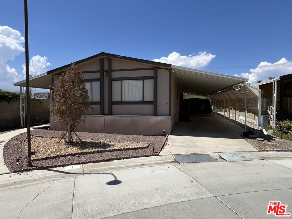Come home to this amazing home nestled among a lovely rear street in one of the best 55+ neighborhoods of Indio. This great home has so much potential with it's great location within this great very well maintained community. You'll always have something to do when your new home community has so many amenities like additional RV parking, pool, spa, bbq, tennis, putting green, parks and clubhouse. Not to mention so many friendly fun neighbors. On those cool nights enjoy a stroll down the extremely quiet street winding throughout your beautiful neighborhood. When it's time to unwind in your amazingly bright and airy new home, you'll feel right at home relaxing in the cozy oversized family room. Enjoy the outdoors and fresh air in your cute back yard just perfect for pets and ready for your own touch by adding a jacuzzi or BBQ or whatever you desire. This great home has a ton of potential by adding your own TLC and updating. At this low price this one won't last! Get it before it's gone!