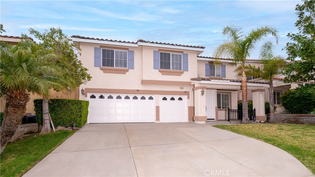Welcome to this stunning home in the sought-after Sierra Lakes Golf Course community. This spacious 4-bedroom, 3-bathroom beauty is upgraded throughout, offering both luxury and comfort. As you enter, you'll be welcomed by a charming formal living and dining area. One of the bedrooms is conveniently located downstairs, providing added privacy and versatility. The heart of the home is the expansive kitchen, which flows seamlessly into the cozy family room featuring a warm fireplace — creating a perfect space for family gatherings and everyday relaxation. The home is filled with natural light, adding to its warmth and inviting atmosphere. Upstairs, you’ll find a luxurious master suite that is the perfect retreat, complete with dual sinks, a large soaking tub, a separate walk-in shower, and a spacious walk-in closet. Additionally, there’s a sizable loft area that offers endless possibilities. Located just minutes from shopping, dining, golf courses, and more, this home is the ideal blend of style, comfort, and convenience. Don't miss out on the opportunity to make this dream home yours!