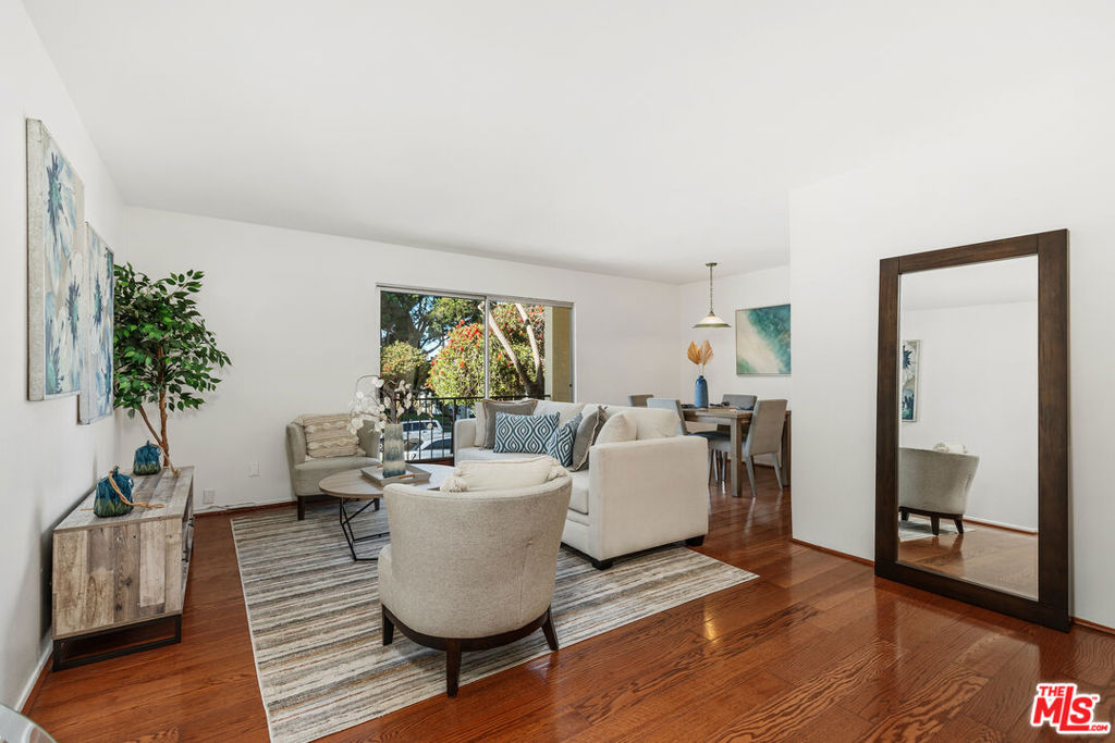 Beautiful bright and airy Ocean Park condo overlooking Hotchkiss Park. Situated in one of the most sought after neighborhoods in Santa Monica, this 1-bedoom, 1-bathroom unit offers a blend of coastal-contemporary style, convenience and relaxation. The private balcony overlooks the park with views of the ocean which you can enjoy while relaxing and sipping your coffee. The unit comes with assigned covered parking in a secured and gated garage. This incredibly well-maintained building offers a community gym, pool, bike storage and laundry. The HOA maintains strong reserves with low dues, earthquake insurance, a new roof, and seismic retrofitting. Enjoy living just blocks away from the Main Street shops and restaurants, Santa Monica beach, 3rd Street Promenade, Abbot Kinney Blvd and more.