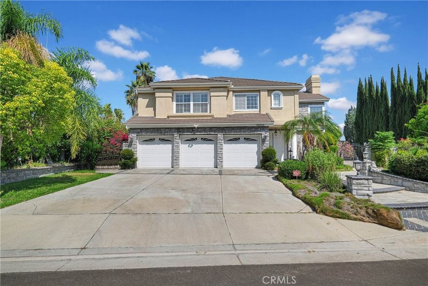 Discover your dream home in this stunning 5-bedroom, 4.5-bath residence boasting and approx. 3,665 sq.ft. of luxurious living space on an expansive 27,000+ sq.ft. lot. This is an elegant south-facing home in the prestigious Belgate Estates of Walnut. Step inside to find a formal living room with soaring cathedral ceilings and a separate dining room, perfect for entertaining. The chef's kitchen features upgraded granite countertops and stainless steel appliances, seamlessly opening to a cozy family room complete with a warm fireplace. The main floor includes a convenient en-suite bedroom with its own bathroom, along with a stylish half bath for guests. Upstairs, the expansive master suite offers a private retreat with its own romantic fireplace and a terrace where you can unwind and enjoy picturesque views.The beautifully landscaped backyard is perfect for entertaining with a private pool, patios, and breathtaking hillside and city light views. Additional highlights include 26 pieces paid-off solar panels, providing both energy efficiency and cost savings. With a 3-car garage and basketball court. Located in the award-winning Walnut School District, this home is just minutes from Mount Sac College, walking trails, parks, schools, and shopping. A rare opportunity to own a dream estate in one of Walnut’s most desirable neighborhoods and enjoy a lifestyle of comfort and convenience!