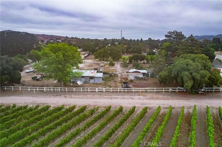 Unique Los Alamos Opportunity. Looking for land with character & vintage charm in Los Alamos? This rare offering includes three adjacent legal parcels (APNs 101-141-002, 101-100-052, 101-141-003) totaling 1.38Â± acres, all zoned C-3. Together, they create a versatile corner property with older structures & multiple possibilities. The property features an authentic older farmhouse and a workshop barn space, along with a third open parcel, perfect for future development or expansion.



The land is fenced, backs to a vineyard with stunning views, & benefits from flexible C-3 zoning that allows for a wide range of commercial uses. Currently, the property is rented as a contractor's storage yard, offering income potential while you design your special project. Whether you envision a small commercial development or even a small in-town farm for animals and crops, this property offers some fun possibilities in a rural location.



Located in the popular town of Los Alamos, you're just minutes to Los Olivos, the Santa Ynez Valley wine country, Santa Maria, & the beaches of Santa Barbara's coast. A rare chance to own three parcels in one of the Central Coast's most sought-after communities. Easy to show. Don't miss this opportunity!
