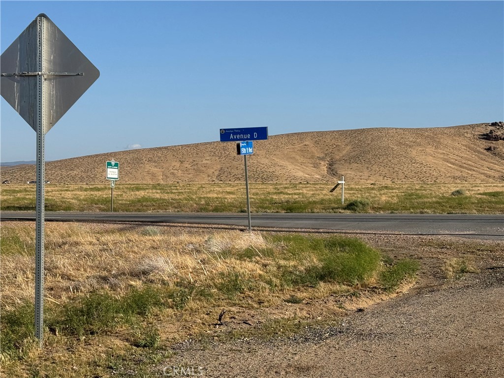 Two adjoining parcels with 157 acres in total on a paved street with electric available! Land is mostly flat and usable, located near solar farms on the NW corner of Ave D/150th St W! The corner of the property is adjacent to the massive 2100-acre AV Solar Ranch 230 Mega Watt location. This premium property offers 157 acres of open space with 1/2 mile of Highway 138 frontage (Ave D). The two lots included are: 3258-011-029 and 3258-011-030. Property is zoned A2, which allows horse boarding, dog kennels, etc as well as your own custom home! Excellent opportunity to own sizable acreage such a short drive from town! Buyer to verify all information.